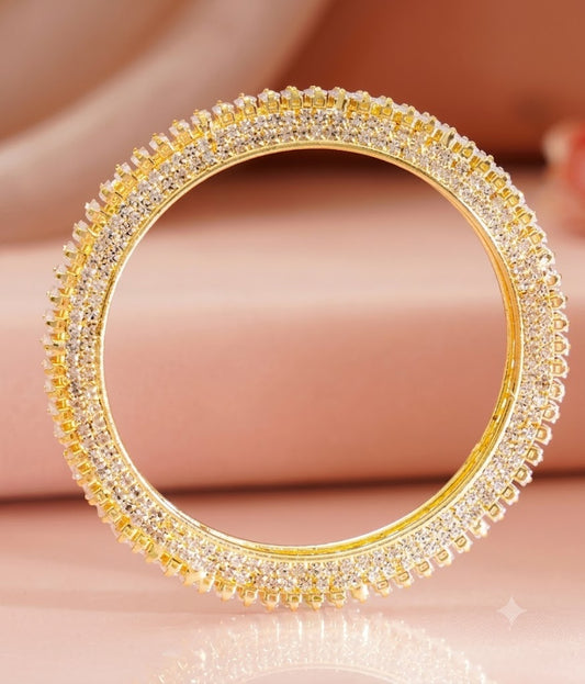 The Stellar Sparkle: Gold & Baguette Crystal Bangle Pair