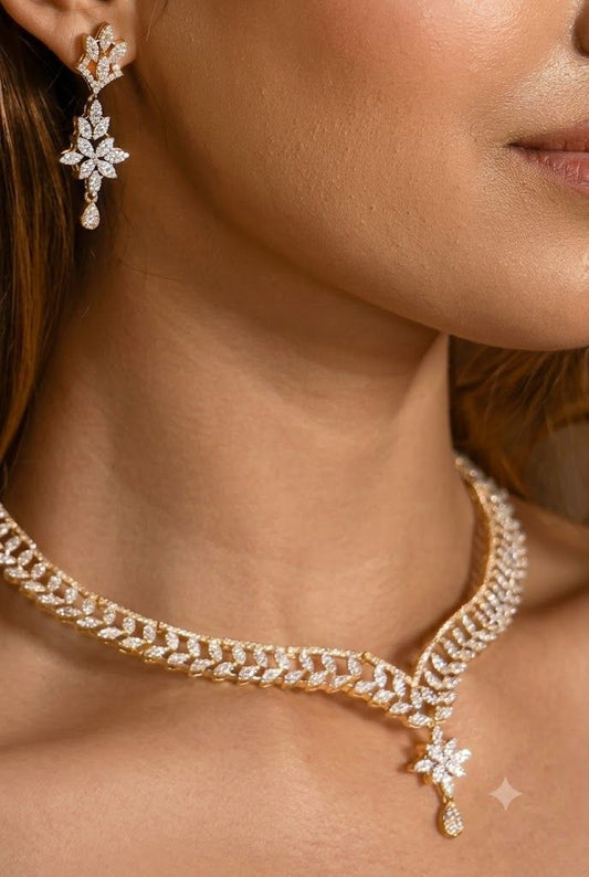The Celestial Leaf Motif: Gold & Crystal Floral Drop Set