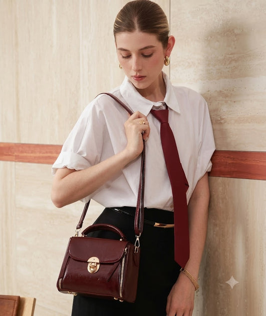 The Vintage Burgundy Twist-Lock Satchel