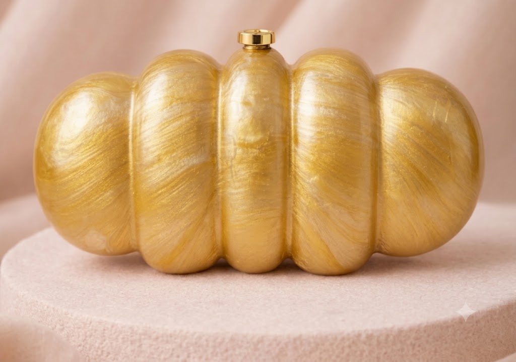 The Aurelia Ribbed Gold Minaudière