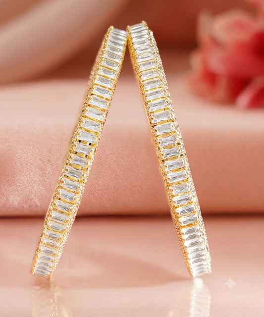 The Stellar Sparkle: Gold & Baguette Crystal Bangle Pair