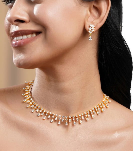 The Celestial Cascade: Gold & Teardrop Crystal Jewelry Set