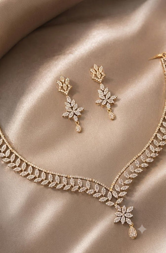 The Celestial Leaf Motif: Gold & Crystal Floral Drop Set