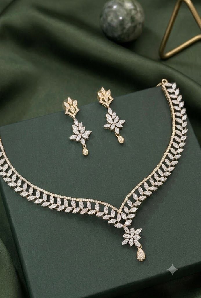 The Celestial Leaf Motif: Gold & Crystal Floral Drop Set