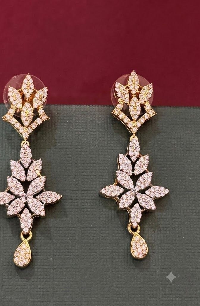 The Celestial Leaf Motif: Gold & Crystal Floral Drop Set